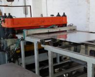 END-TRIMMING MACHINE